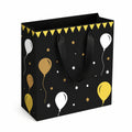 Sac cadeau 26 x 12 x 32 cm en papier noir à poignées avec motif ballons